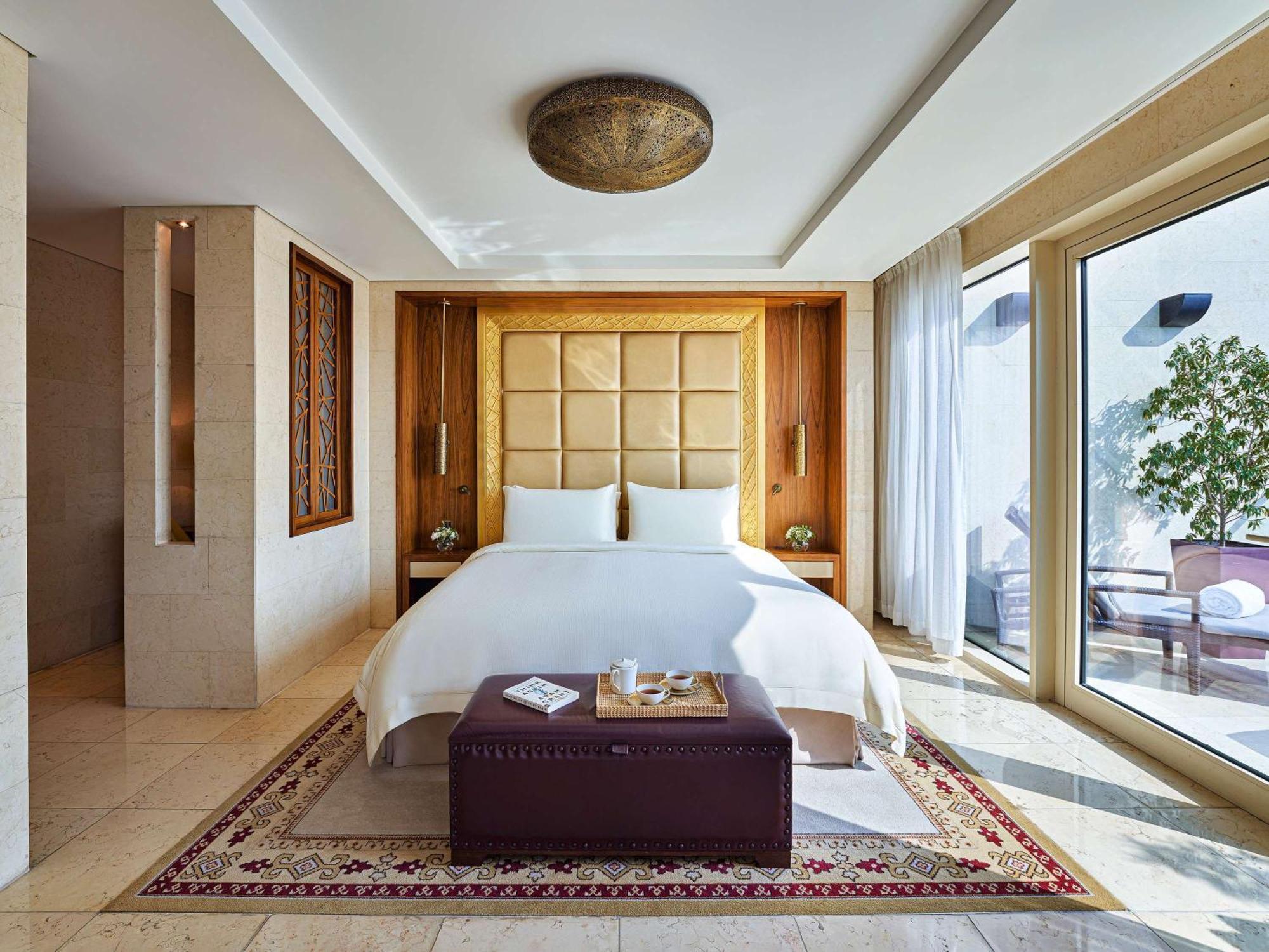 Hotel Raffles Dubai Esterno foto A bedroom at the hotel
