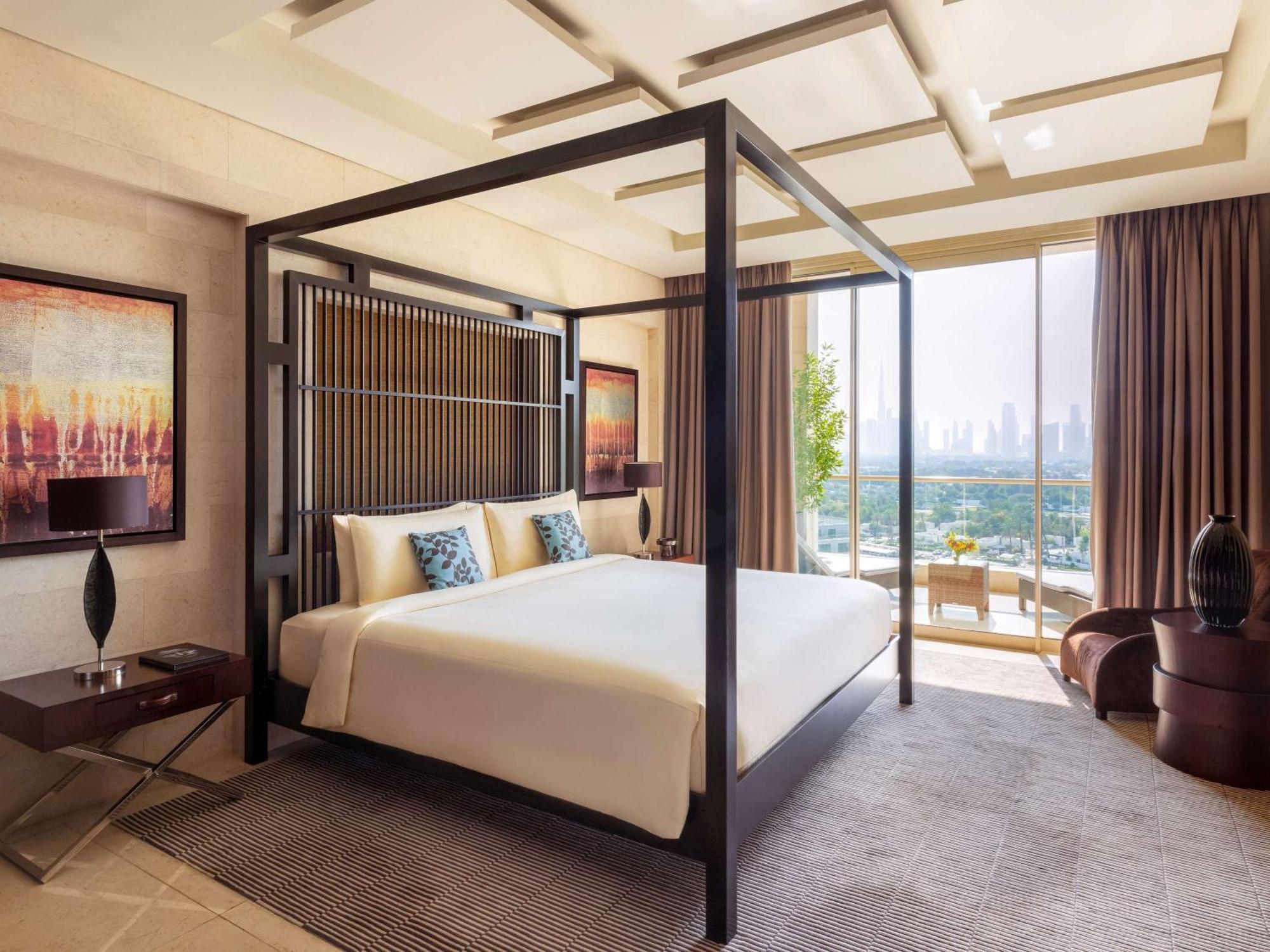 Hotel Raffles Dubai Esterno foto A bedroom at the hotel