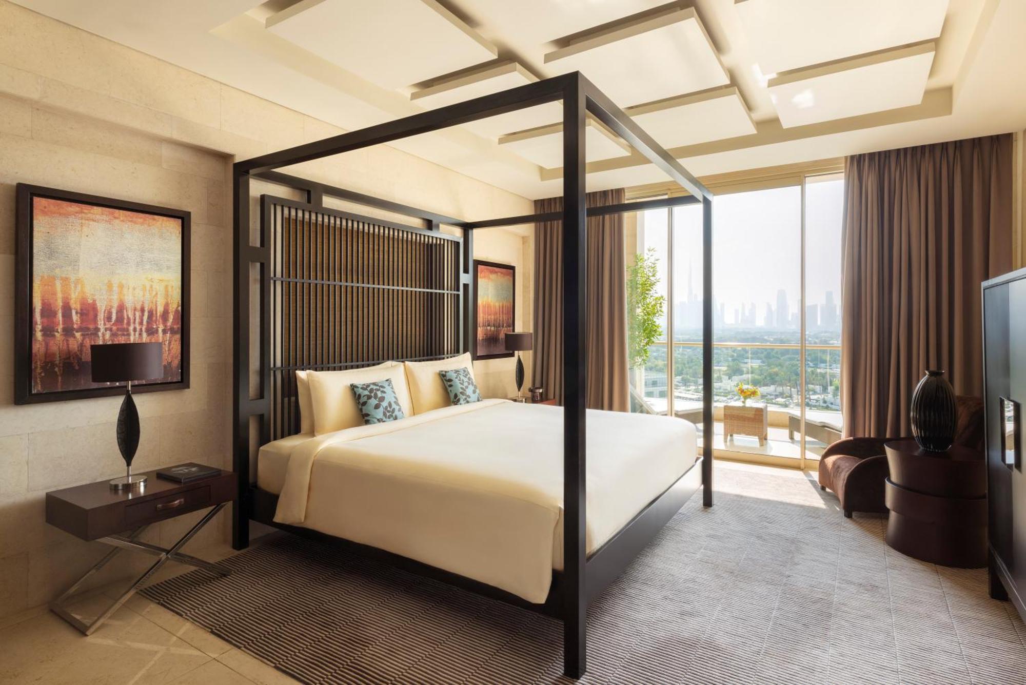 Hotel Raffles Dubai Esterno foto A bedroom at the hotel