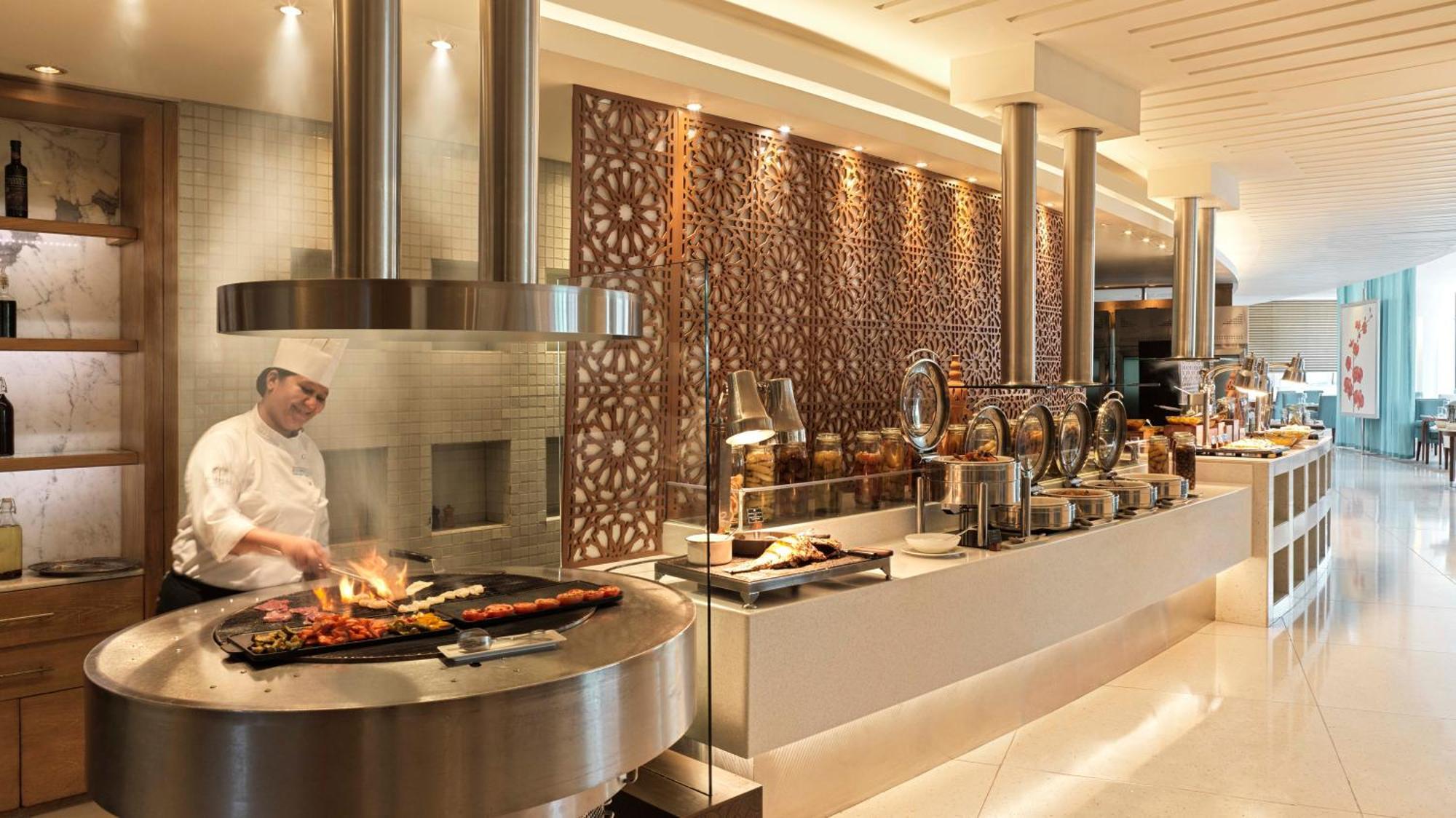 Hotel Raffles Dubai Esterno foto The buffet at the hotel
